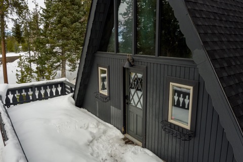 Front door and windows of the A-frame.